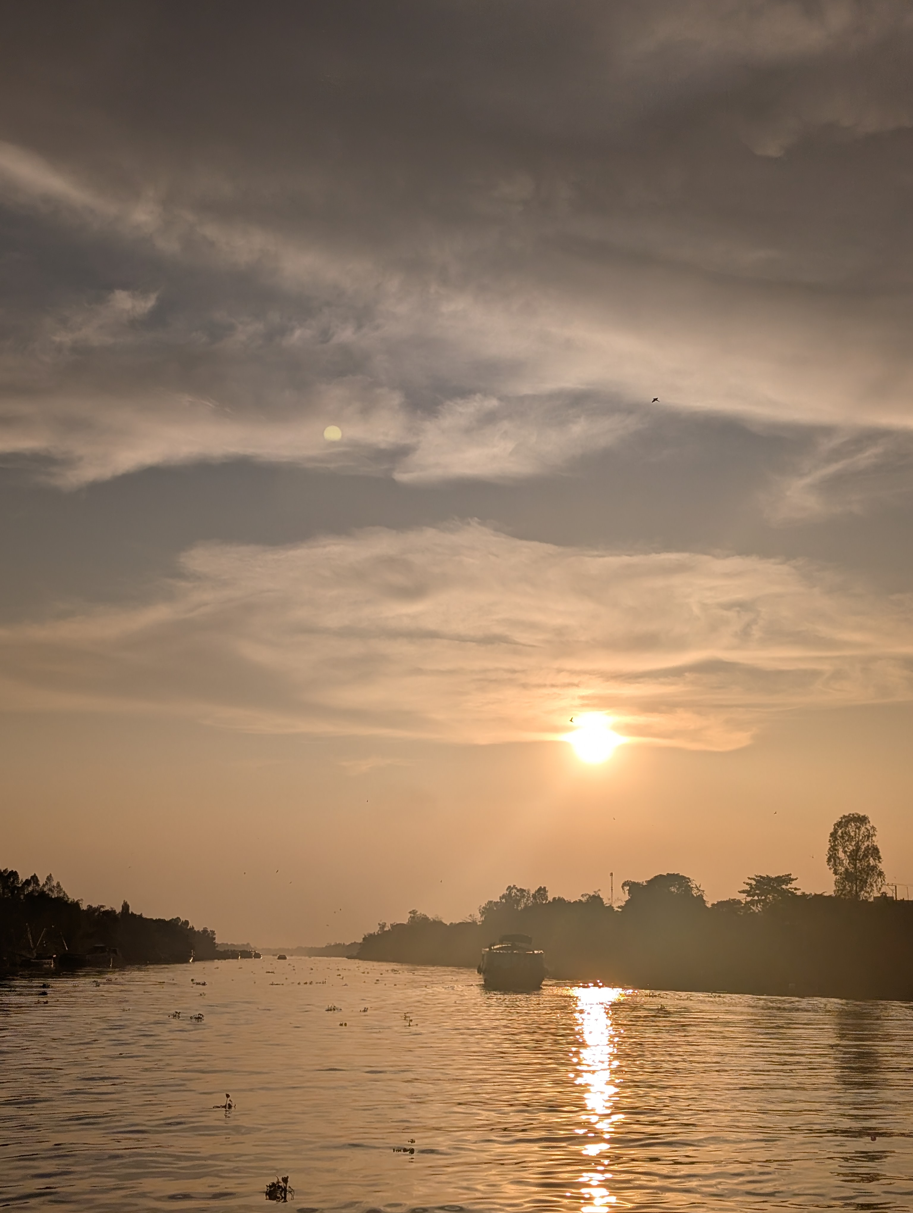 Sunset over Mekong river as we left Cambodia for Vietnam.