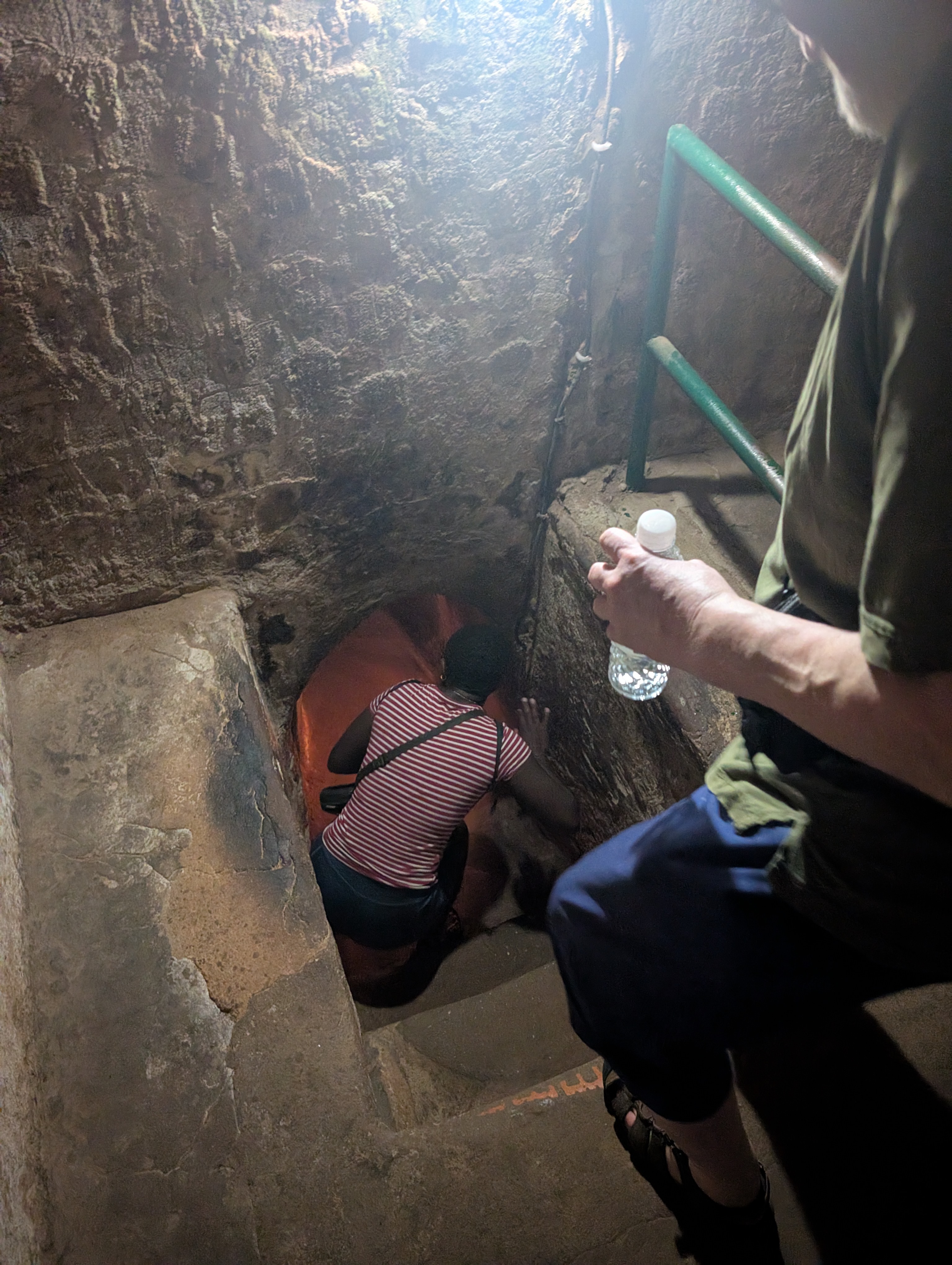 Mary-Ann looking into the Cu Chi tunnels.