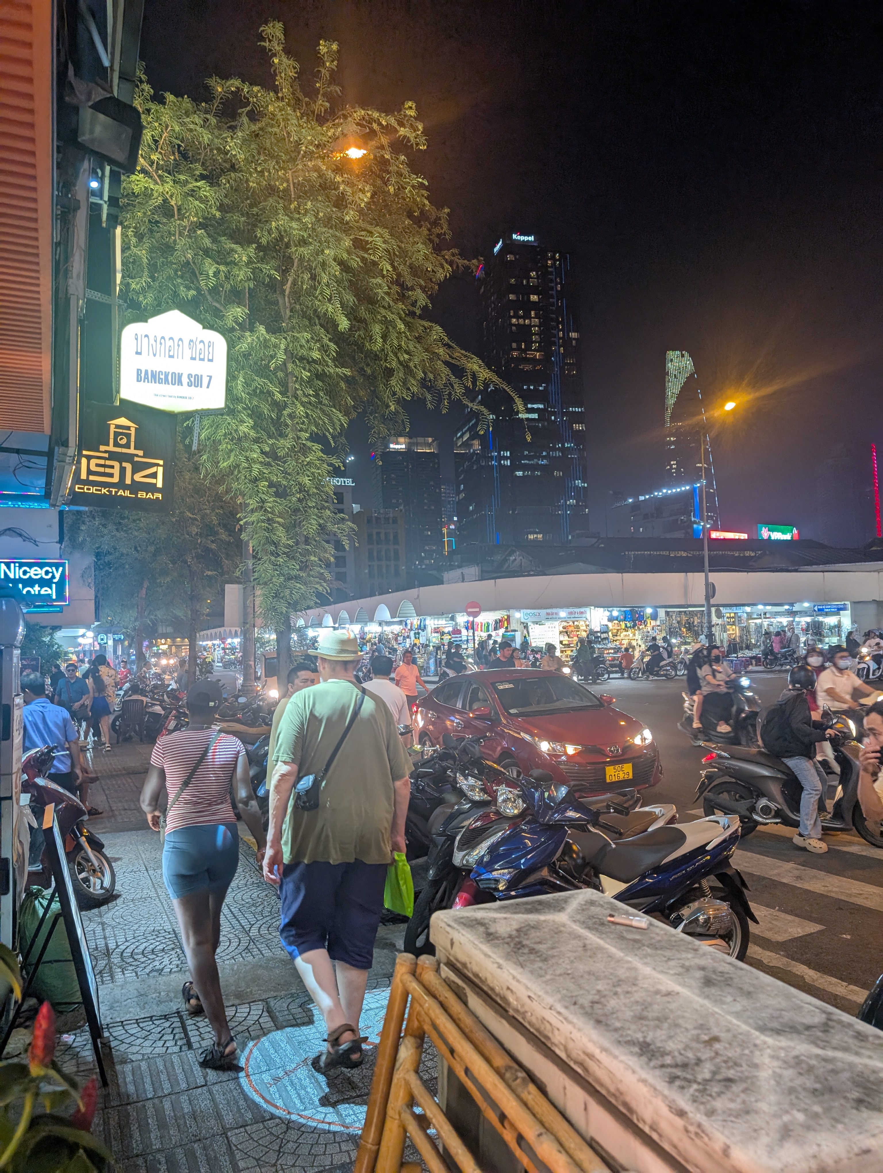 My Dad and Mary-Ann walking along a busy Ho Chi Minh street.