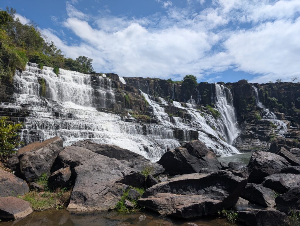 Pongour waterfall is huge and wide cascading.