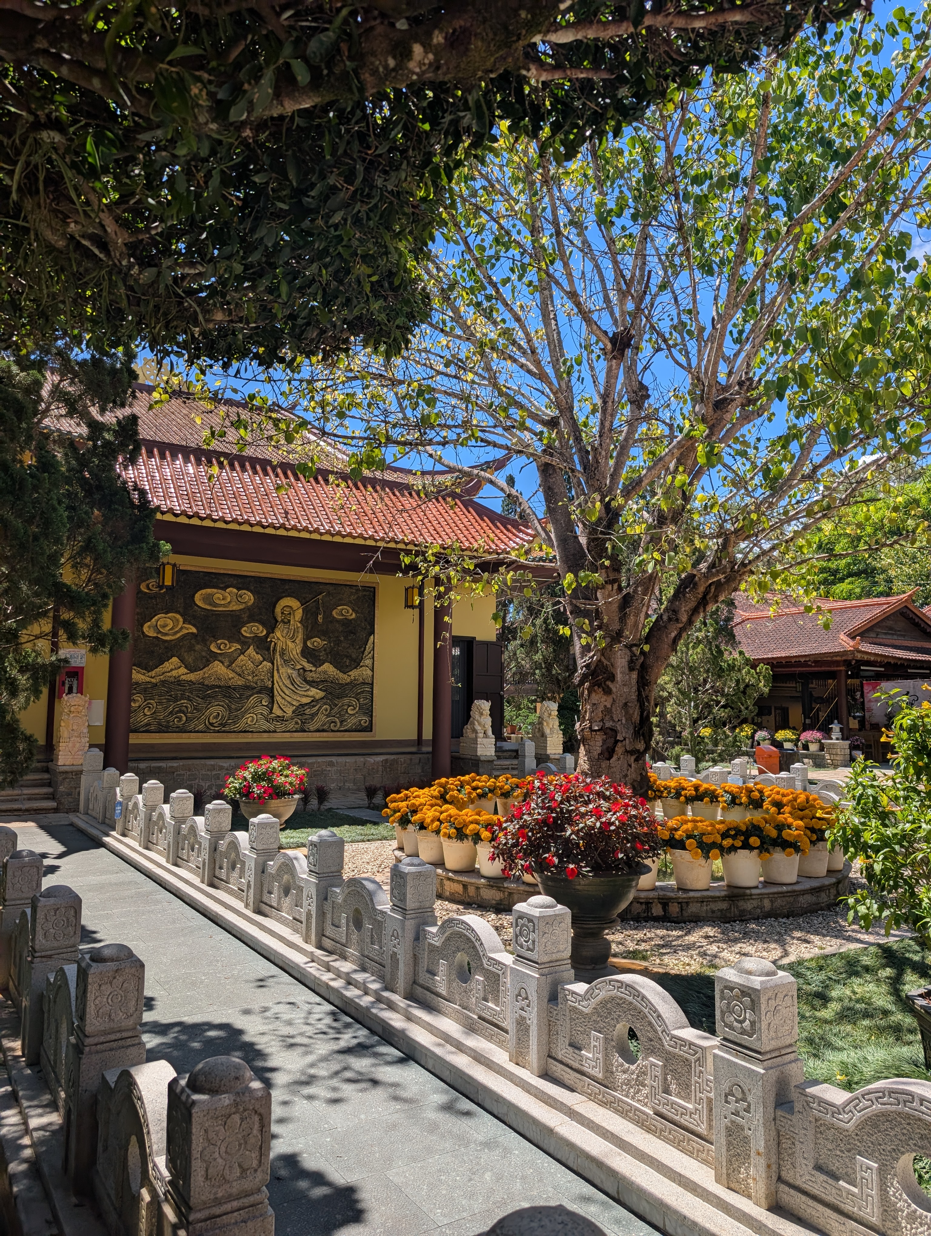 A pretty flower garden in a temple grounds.