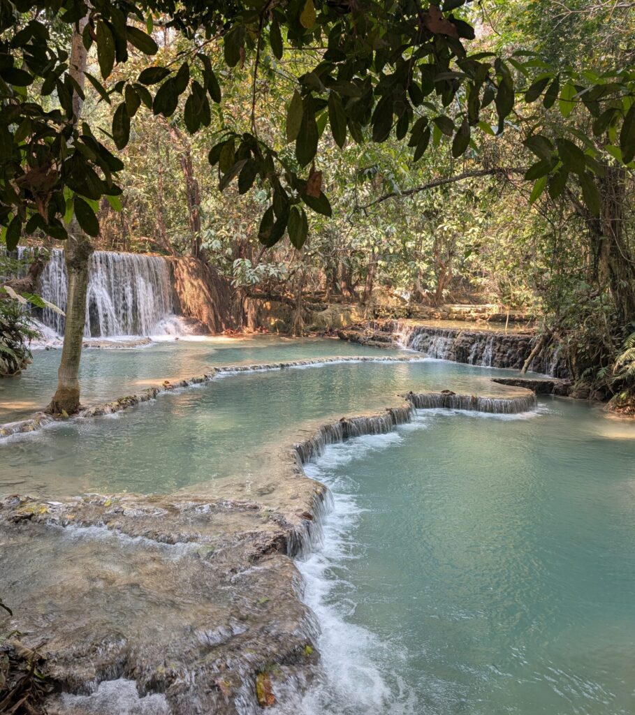 A beautifull flow stone waterfall, running with milky blue water.