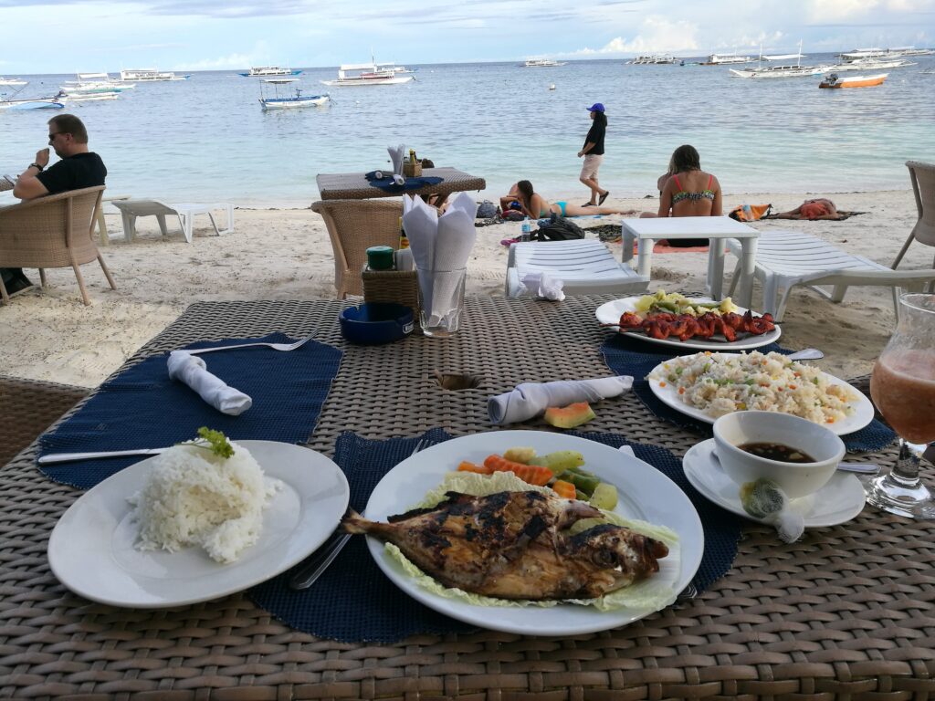 An image of a grilled fish meal we had in Panglao back in 2015, with a fish named after me - a jack fish! 
