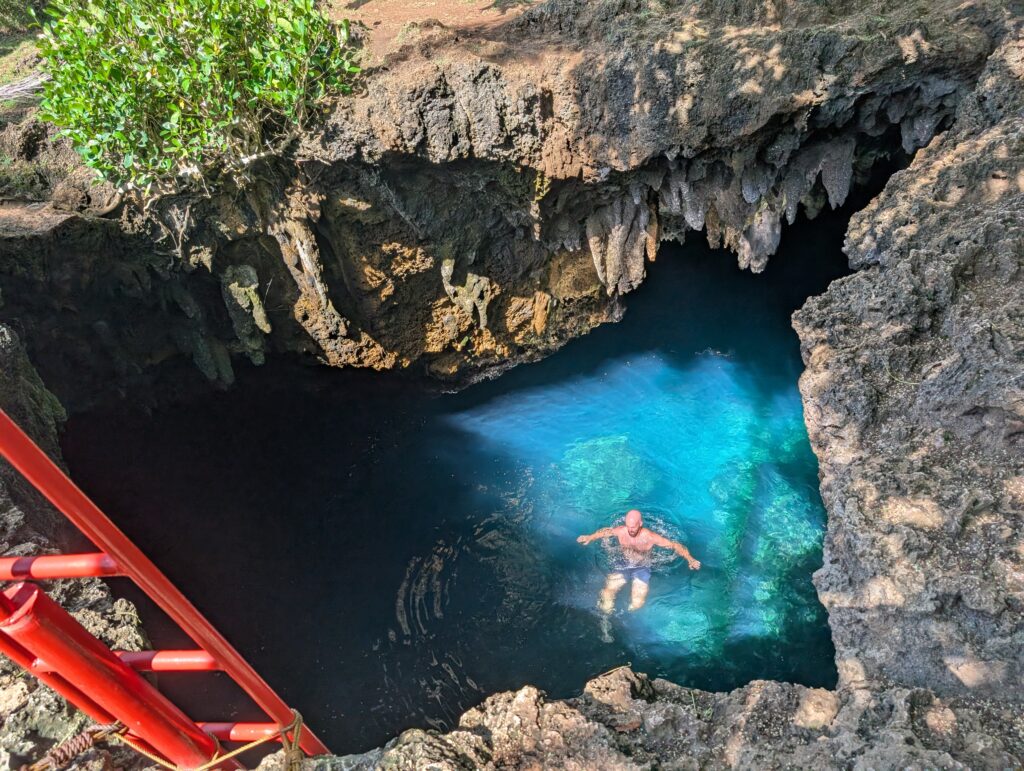 Me taking a swim in the blue waters of one of Andas cave pools.