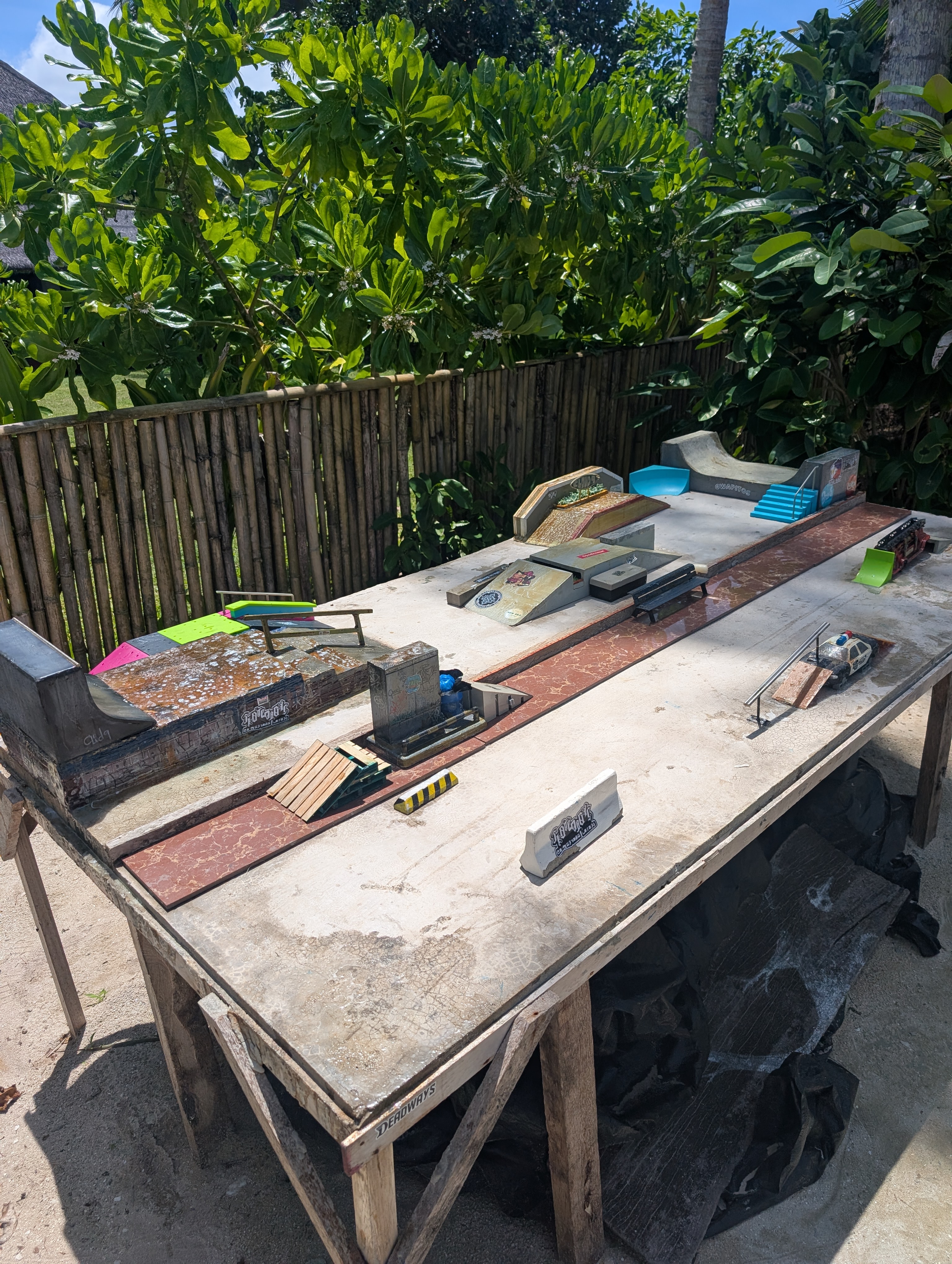 A Tech-deck finger-board skate park on a table top by the beach inGeneral Luna.