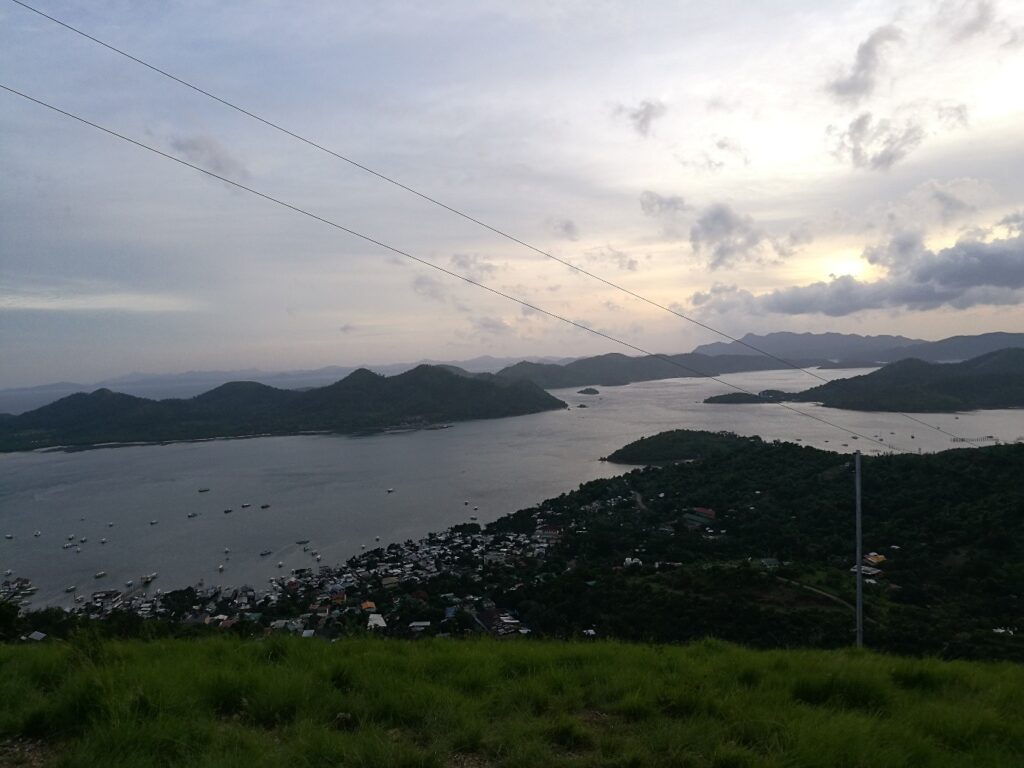 A cloudy picture from a top Coron  hill back in 2015, looking out across the island-riddled sea.