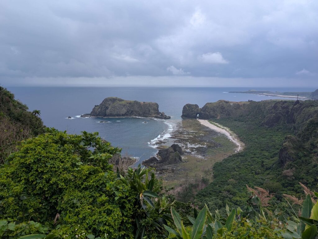 A beautiful rocky headland view on Green island, you can see a huge rock stack out to see and a small arch too.