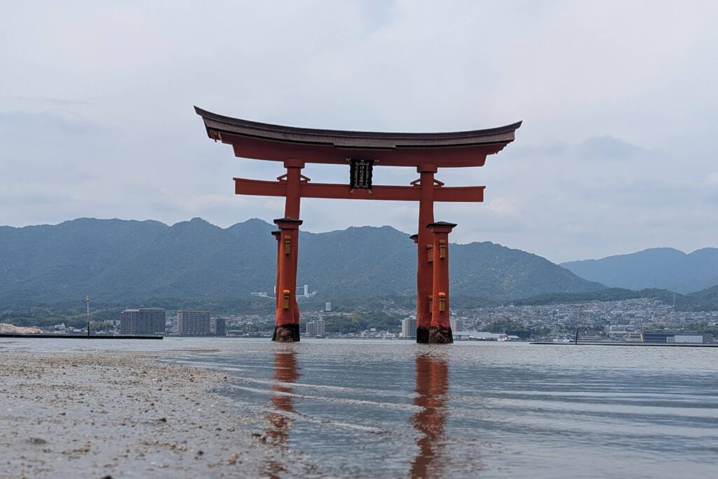 An image of a Torii, standing in the sea off the coast of Miyajima island.