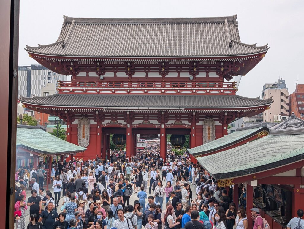 An image of a temple in Tokyo, also completely filled with tourists.